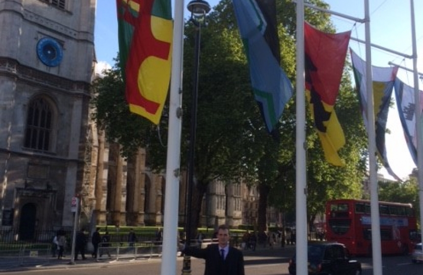 David in Parliament Square with the Monmouthshire flag
