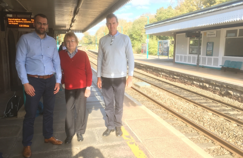 Monmouth MP David Davies with County Cllr Maureen Powell and a Network Rail official.