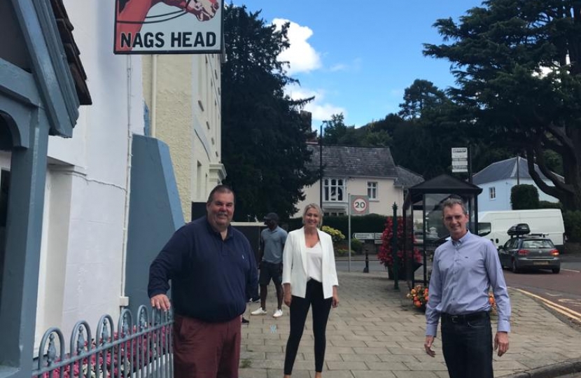 David Davies MP and South Wales East MS Laura Anne Jones mark the launch of the Eat Out to Help Out scheme with Simon Key of the Nags Head in Usk. 